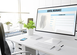Dental insurance form on computer screen in office