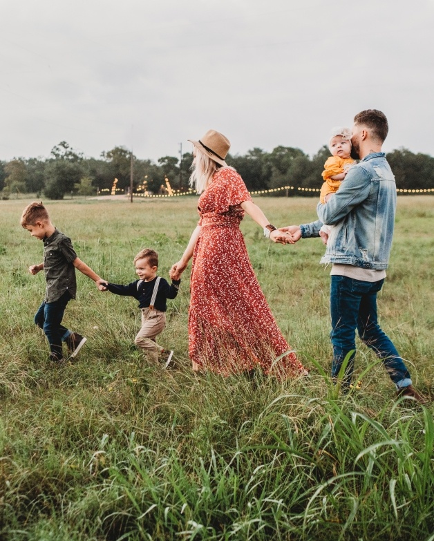 Family holding hands and walking together