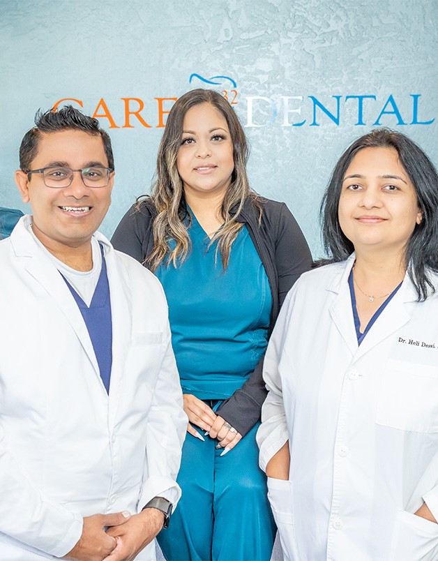 Grand Prairie dental team member taking patient's temperature