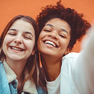 Two teen girls taking a selfie 
