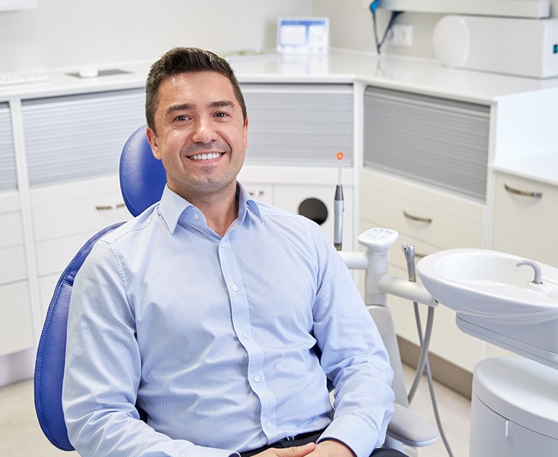 Smiling man at preventive dentistry appointment
