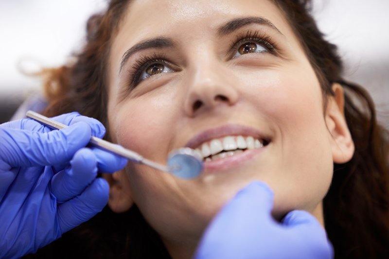 Closeup of woman smiling at dentist appointment