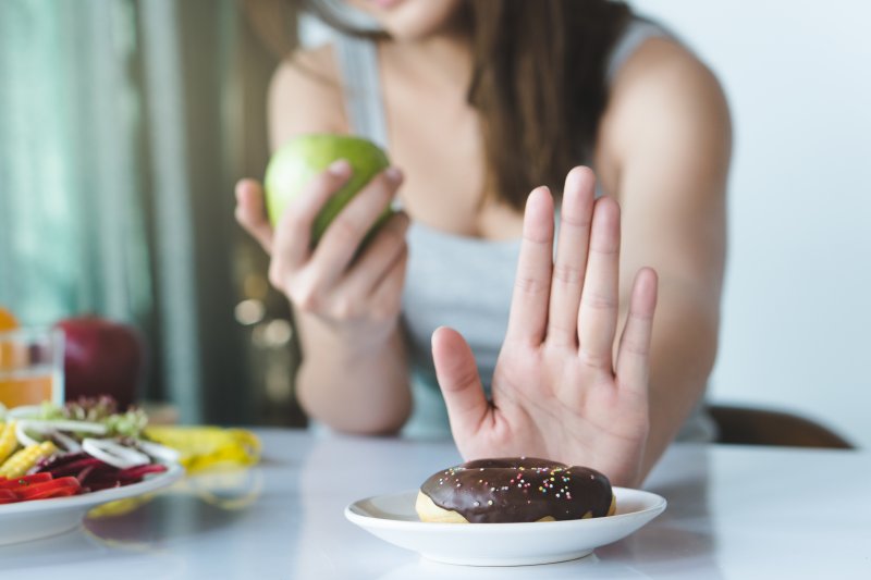 woman avoiding donut in Grand Prairie