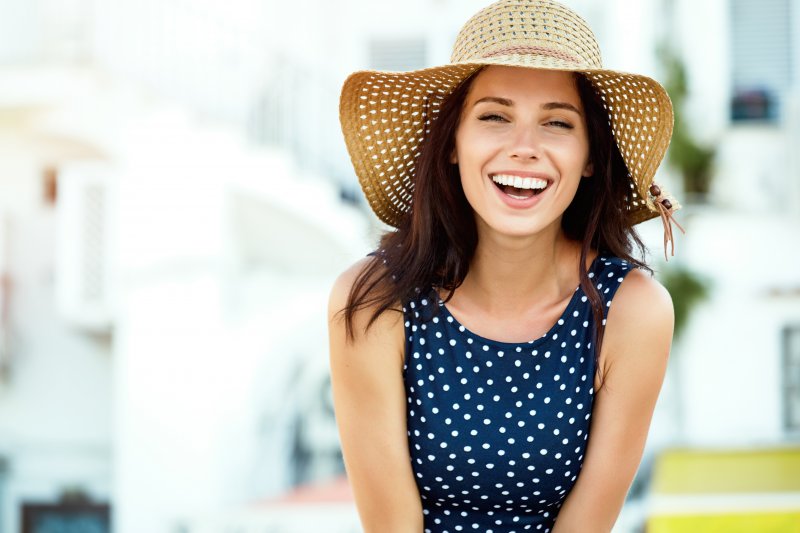woman smiling in the sun